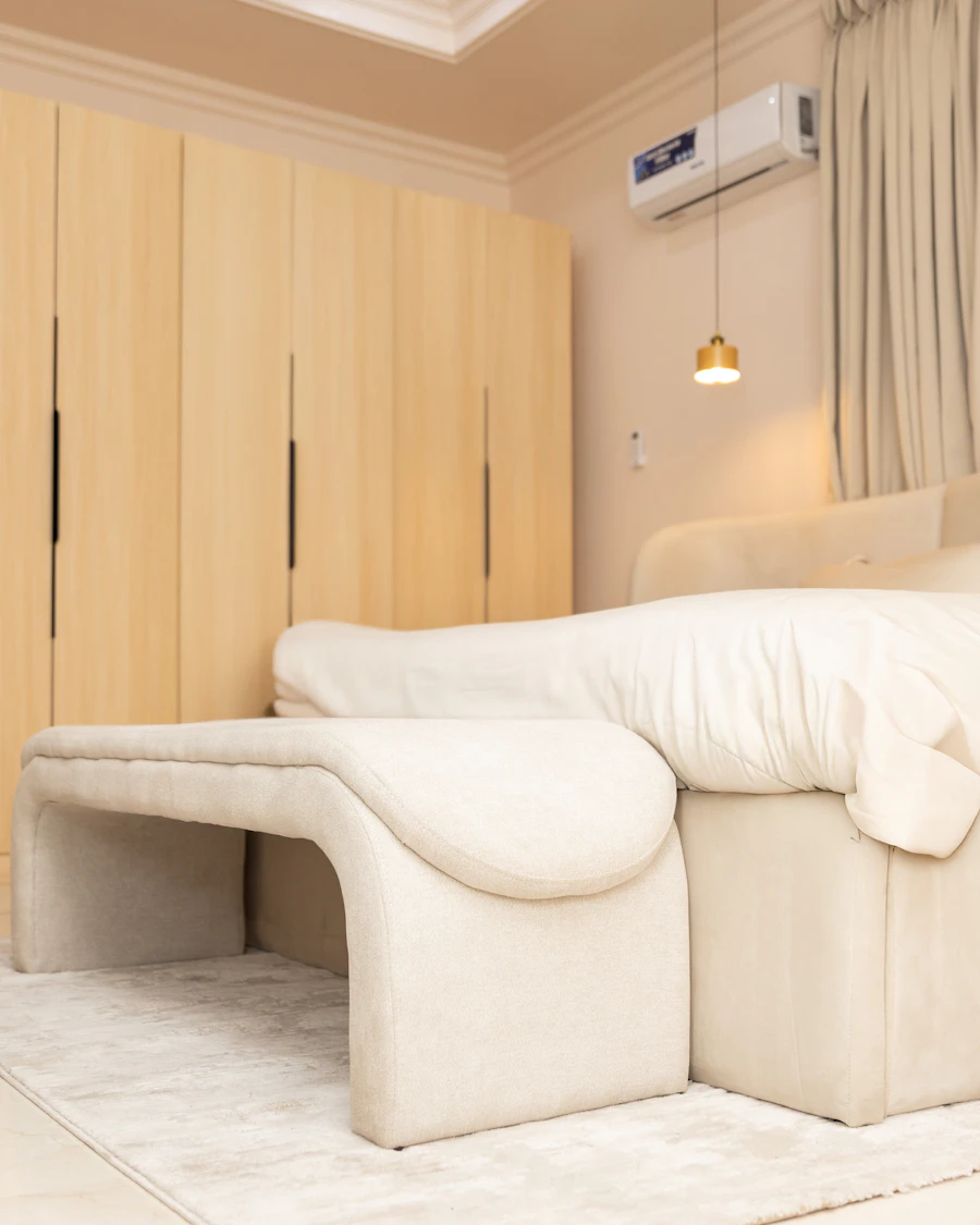 Bedroom with fitted wardrobes, vitrified tile flooring and a solid timber door